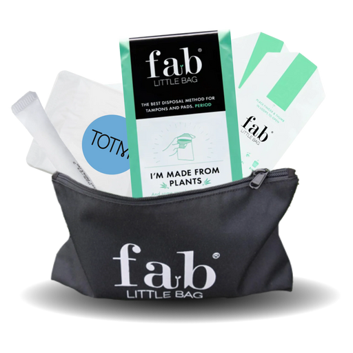 Black 'fab'Little Bag with tampon applicators and packaging on a white background