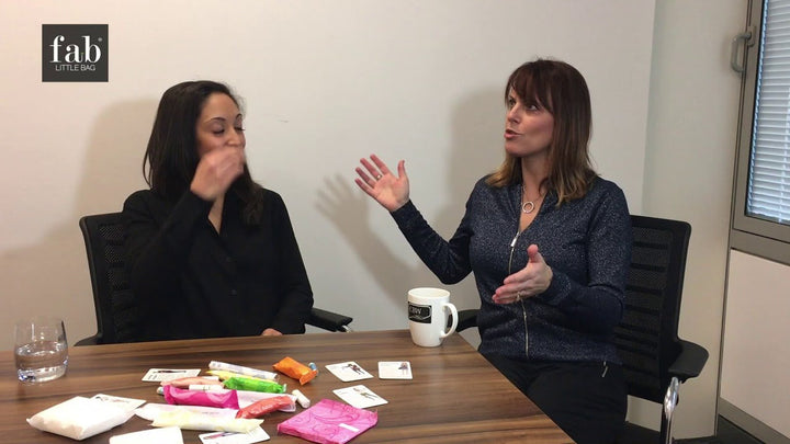 two women talking about sanitary products